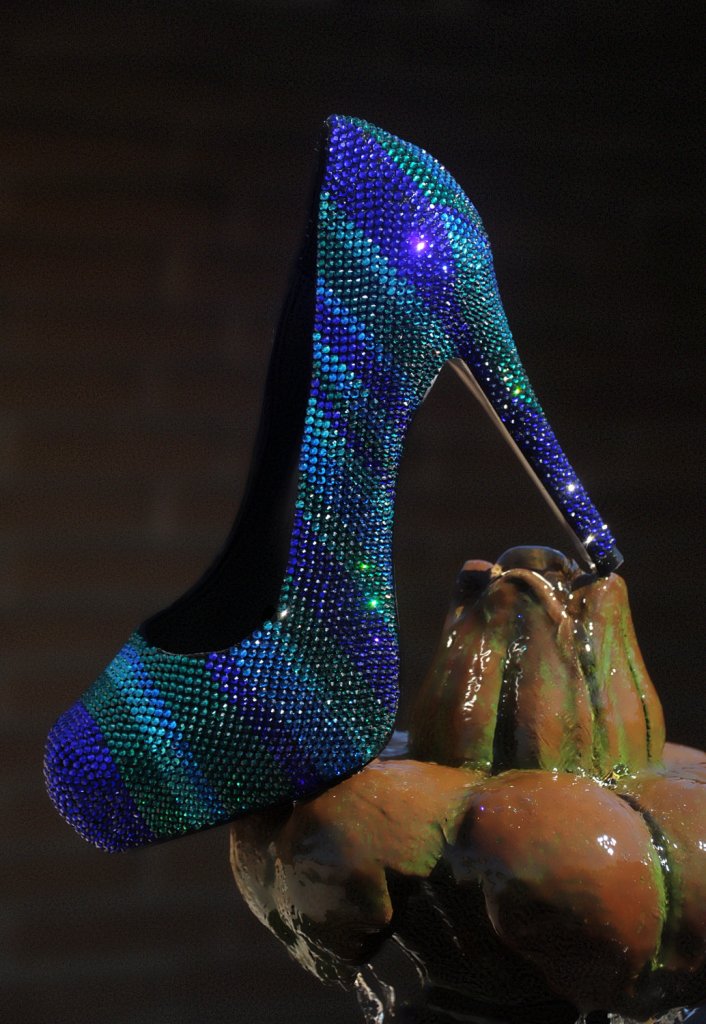 When she told me that she had her reception dress 'chopped' so people could see her shoes I knew the pressure was on